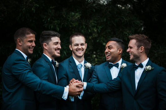 Should Groomsmen Wear Matching Suits? Experts Weigh In